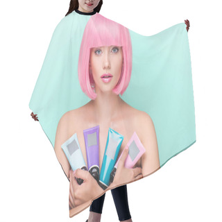 Personality  Beautiful Young Woman With Pink Bob Cut Holding Various Tubes Of Coloring Hair Tonics Looking At Camera Isolated On Turquoise Hair Cutting Cape