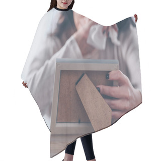 Personality  Cropped View Of Upset Woman Holding Picture Frame And Crying At Home Hair Cutting Cape