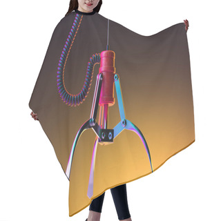 Personality  Machine Robotic Claw On Yellow Gradient Background. Crane Game. 3d Rendering Hair Cutting Cape