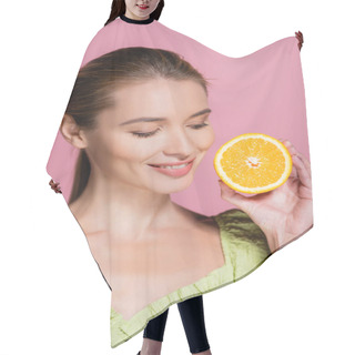 Personality  Pretty Woman With Natural Makeup Holding Half Of Ripe Orange Isolated On Pink Hair Cutting Cape