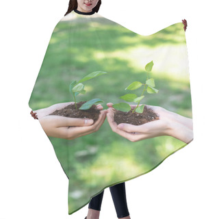 Personality  Cropped View Of Girls Holding Ground With Seedlings In Hands Hair Cutting Cape