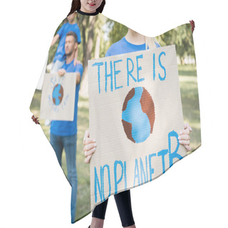 Personality  Woman Holding Placard With Globe And There Is No Planet B Inscription Near Family With Posters On Blurred Background, Ecology Concept Hair Cutting Cape