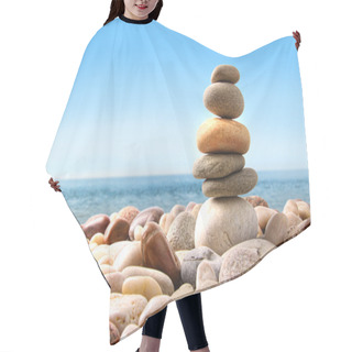 Personality  Stack Of Pebble Stones On White Hair Cutting Cape
