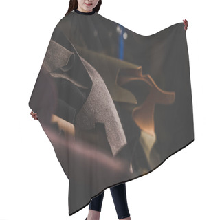Personality  Selective Focus Of Cut Pieces Of Genuine Leather In Workshop Hair Cutting Cape