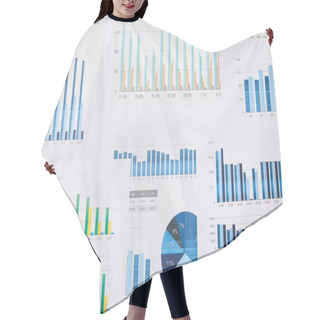 Personality  Top View Of Papers With Charts And Graphs On Table  Hair Cutting Cape