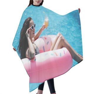 Personality  Pleased Woman Adjusting Sunglasses While Holding Glass With Cocktail And Swimming On Inflatable Ring In Pool Hair Cutting Cape