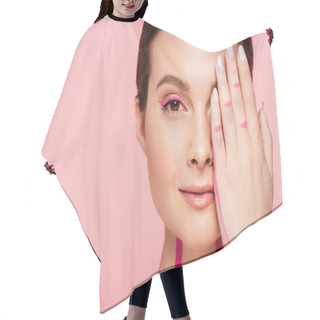 Personality  Beautiful Woman With Pink Lines On Body Covering Face With Hand Isolated On Pink Hair Cutting Cape