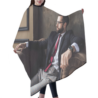 Personality  Confident Bearded Businessman Sitting In Armchair  Hair Cutting Cape