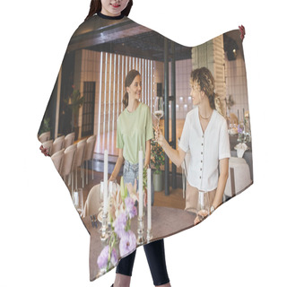 Personality  Decorator Holding Glass Near Smiling Colleague And Table With Festive Setting, Candles And Flowers Hair Cutting Cape