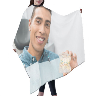 Personality  Handsome African American Man Holding Dental Jaw Model With Braces Hair Cutting Cape
