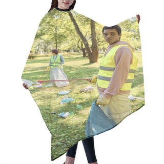 Personality  Socially Active Diverse Couple Cleaning A Park Together. Hair Cutting Cape