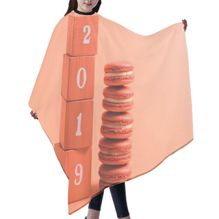 Personality  Stack Of Wooden Cubes With 2019 Numbers And Macarons On Coral Background, Color Of 2019 Concept Hair Cutting Cape