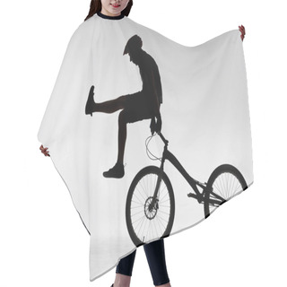 Personality  Silhouette Of Trial Cyclist Standing On Handlebars With Hands On White Hair Cutting Cape