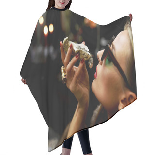 Personality   Portrait Of A Stylish Glamorous Girl With An Oyster Full Of Jewelry At Her Mouth. Hair Cutting Cape