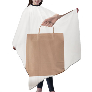 Personality  Cropped Image Of Woman Holding Paper Bag With Food Delivery On White Hair Cutting Cape