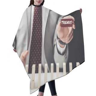 Personality  Partial View Of Businessman Holding Brick With 'trends' Word And Preventing Wooden Blocks From Falling Hair Cutting Cape