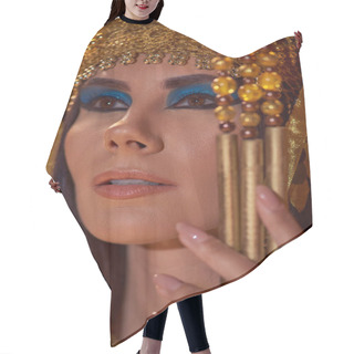 Personality  Portrait Of Elegant Woman With Bold Makeup And Egyptian Headdress Holding Flail Isolated On Brown Hair Cutting Cape