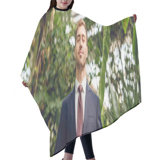 Personality  Panoramic Shot Of Joyful Businessman With Closed Eyes In Greenhouse Hair Cutting Cape