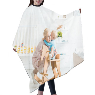 Personality  Cute Toddler Son Hugging Happy Blonde Mother Near Rocking Horse  Hair Cutting Cape