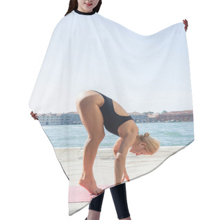 Personality  Side View Of Barefoot Woman In Bodysuit Practicing Yoga On Mat On Embankment In Venice  Hair Cutting Cape
