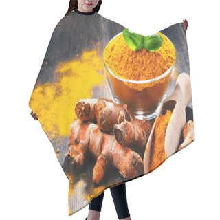 Personality  Composition With Bowl Of Turmeric Powder On Wooden Table Hair Cutting Cape