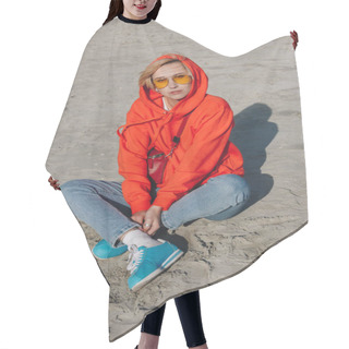 Personality  Stylish Girl In Red Hoodie Sitting On Sandy Beach, Saint Michaels Mount, Normandy, France Hair Cutting Cape