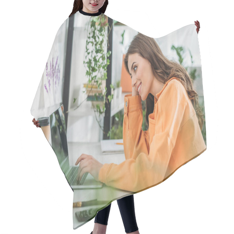 Personality  Selective Focus Of Cheerful Young Woman Siting At Desk, Smiling And Using Laptop  Hair Cutting Cape