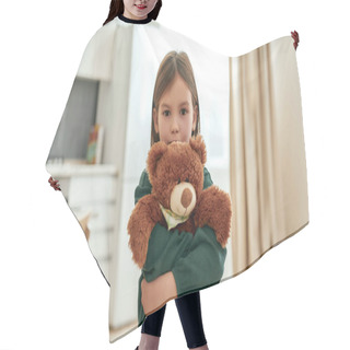 Personality  A Little Girl Embracing A Fluffy Brown Teddy Bear Looking Into A Camera Hair Cutting Cape