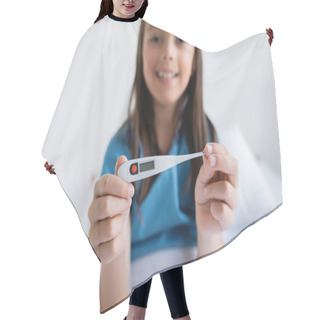 Personality  Blurred Child Holding Electronic Thermometer On Bed In Clinic  Hair Cutting Cape