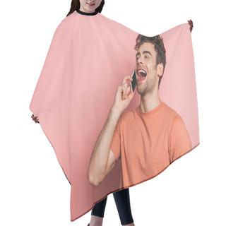 Personality  Cheerful Young Man Laughing While Talking On Smartphone On Pink Background Hair Cutting Cape