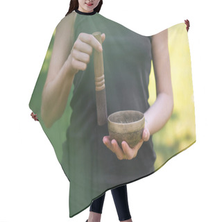 Personality  Cropped Image Of Woman Making Sound With Tibetan Singing Bowl In Park Hair Cutting Cape