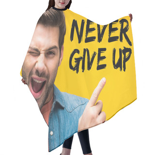 Personality  Handsome Man Pointing With Finger At Never Give Up Lettering And Winking Isolated On Yellow Hair Cutting Cape