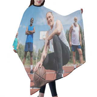 Personality  Selective Focus Of Multiethnic Elderly Sportsmen With Basketball Ball On Playground Hair Cutting Cape