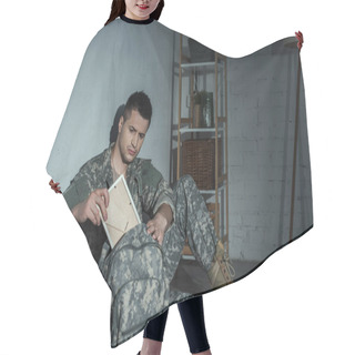 Personality  Military Veteran With Emotional Distress Taking Photo Frame From Backpack At Night  Hair Cutting Cape