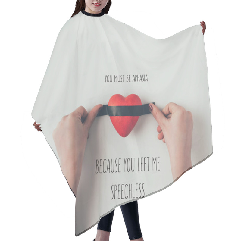 Personality  Cropped Image Of Woman Putting Insulating Tape On Red Heart With Words You Must Be Aphasia Because You Left Me Speechless On White Hair Cutting Cape