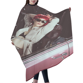 Personality  High Angle View Of Stylish Young Woman In Red Wig, Trench Coat And Sunglasses Sitting In Retro Car  Hair Cutting Cape