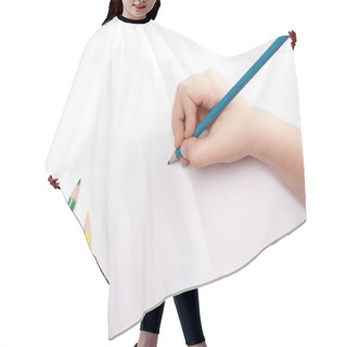 Personality  Child Hand Draws A Blue Pencil. White-gray Background Above View. Hair Cutting Cape