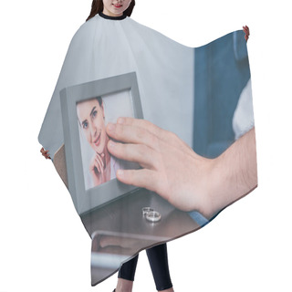 Personality  Cropped View Of Man Touching Photo Frame With Picture Of Woman Near Wedding Rings And Smartphone Hair Cutting Cape