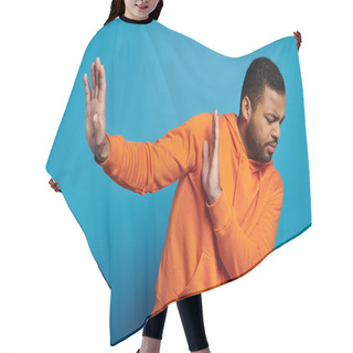 Personality  Worried African American Man In Vibrant Outfit With Closed Eyes Refusing And Hiding Behind Hands Hair Cutting Cape