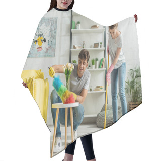 Personality  Happy Man And Woman Doing Spring Cleaning In Apartment  Hair Cutting Cape