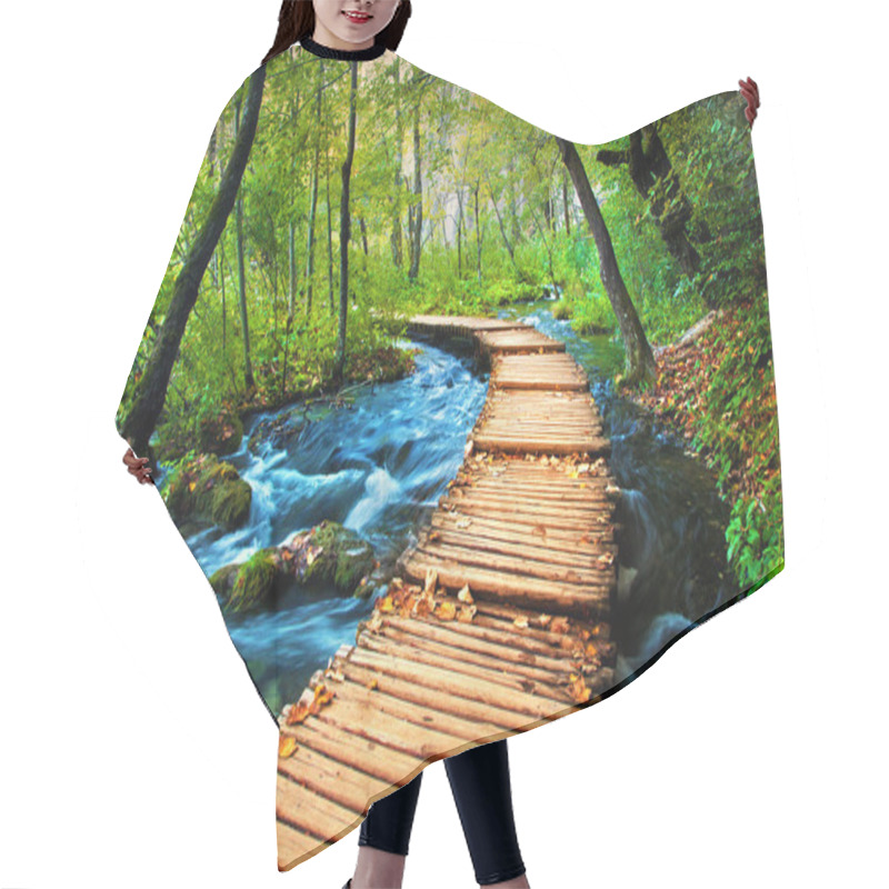 Personality  Deep forest stream. Crystal clear water. hair cutting cape