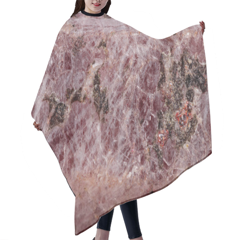 Personality  Macro mineral stone Ruby in the breed a white background close up hair cutting cape