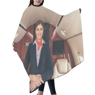 Personality  Smiling Flight Attendant In Uniform Looking At Camera In Private Plane  Hair Cutting Cape