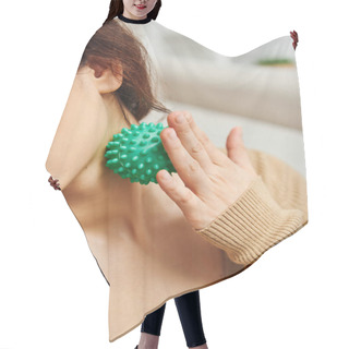 Personality  Cropped View Of Young Woman In Brown Jumper Massaging Lymphatic Nodes With Manual Massage Ball For Drainage At Home, Lymphatic System Support And Home-based Massage, Tension Relief Hair Cutting Cape
