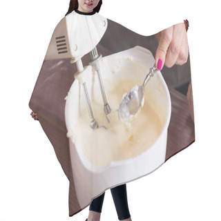 Personality  Whipping The Cream With An Electric Mixer. Close-up. Hair Cutting Cape