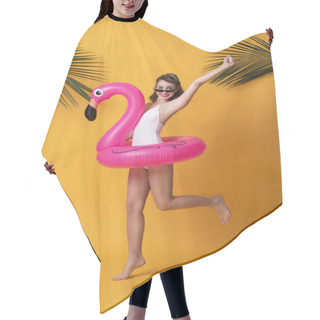 Personality  Happy Smiling Woman Dressed In Swimwear Holding Flamingo Rubber Ring And Enjoying Their Summer Vacation Getaway In Yellow Background. Hair Cutting Cape
