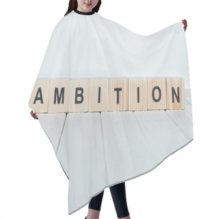 Personality  Close Up View Of Ambition Word Made Of Wooden Cubes On White Wooden Tabletop  Hair Cutting Cape