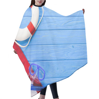 Personality  Life Ring With Mask And Towel On Blue Wooden Background Hair Cutting Cape
