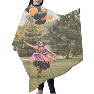 Personality  Joyous Girl In Halloween Costume Holding Balloons And Candy Bucket While Running On Green Grass Hair Cutting Cape