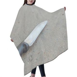 Personality  A Kitchen Knife On A Gray Background. Hair Cutting Cape